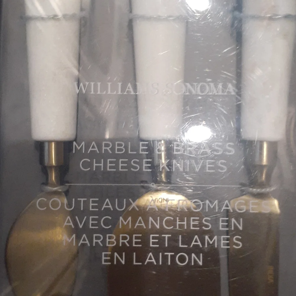 Williams Sonoma marble and brass cheese knives